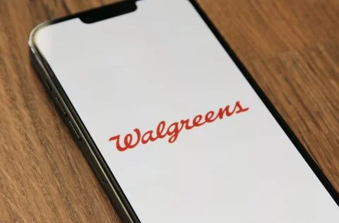 a close up of a cell phone on a table
